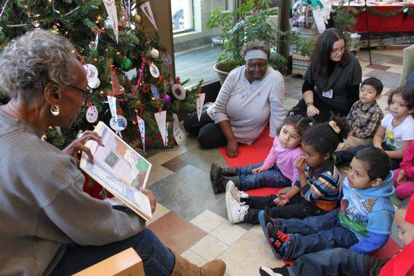 Seniors reading to young children