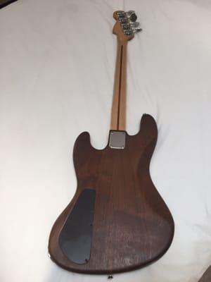 My custom Ransom Jazz body. Dan matched the walnut perfectly. He also perfectly routed for my Bartolini PJs and 69 P Neck.