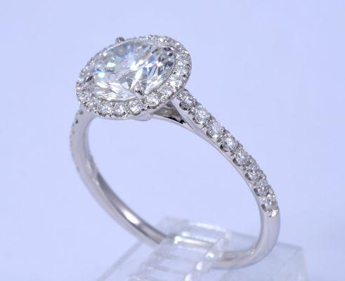 Custom made U set halo with U set diamonds on the shank. Set in 18k G VS diamonds. style 2821