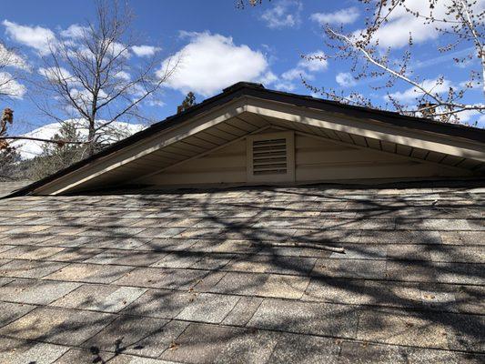 Wavy flashing under gable.