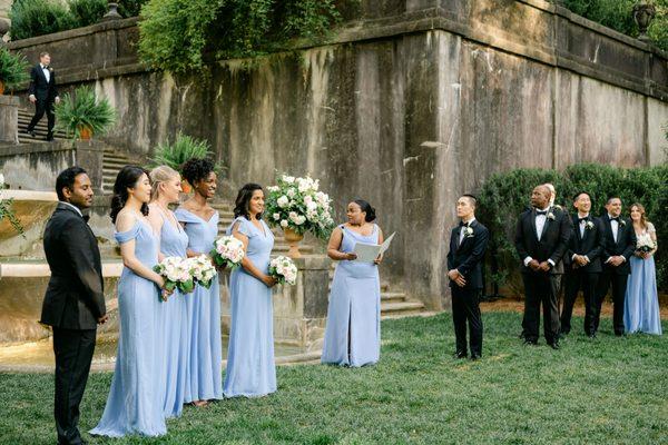 Floor-length bridesmaids dresses in periwinkle and lux chiffon by Bella Bridesmaids. Photo by Leigh Wolfe Photography.