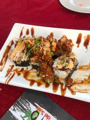 Chaka Roll Bit Spicy  for some. (Cucumber,crab avocado  topped with shrimp tempura & spicy seasoning on top