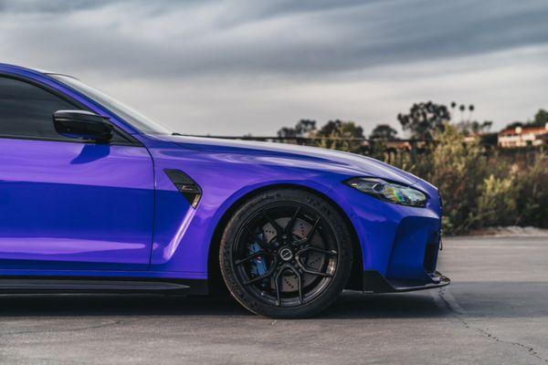 BMW M3 Competition wrapped in CYS Gloss Neon Purple.