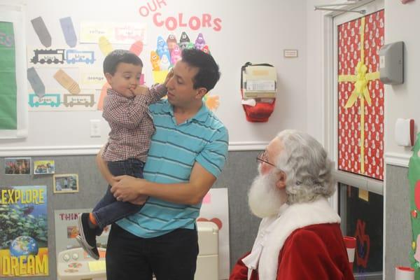 Visiting with Santa at Legacy during the holidays.