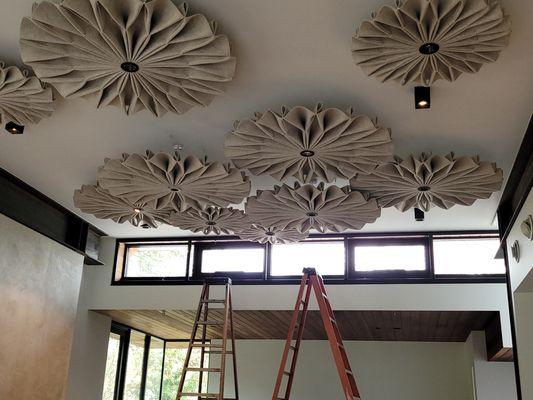 Installation of Buzzy Pleats sound cancellation fixtures