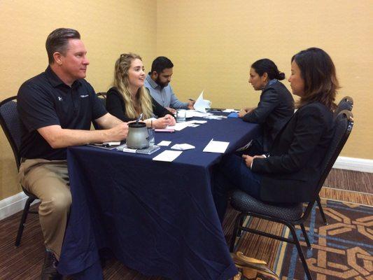 Recruiting and Sales team hard at work interviewing at the local PMI chapter meeting.