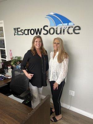 Eadie and the front desk gal at The Escrow Source.