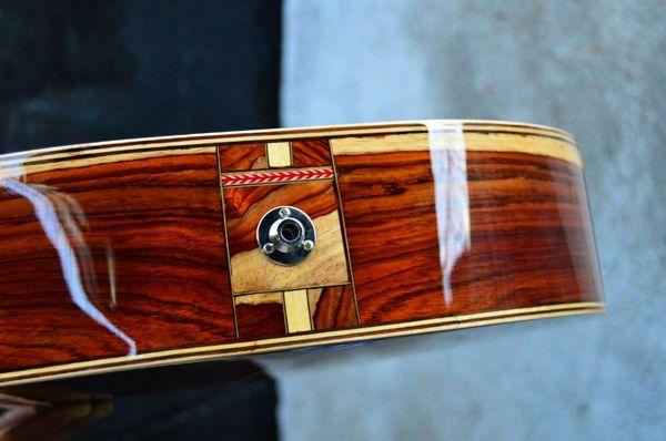 Some of my personal art work on the back heel of this Cocobolo Rosewood Acoustic Guitar