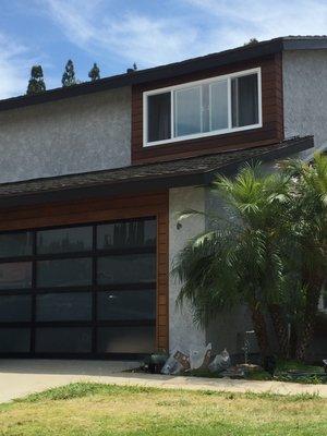 Modern garage door and Ipe siding for a modern feel