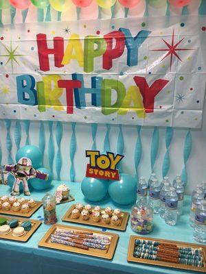 Chocolate covered Oreo, chocolate covered pretzels and lots on this yummy treats table.