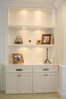 Get organized and show off your favorite items with a new custom built in unit. Available with adjustable shelves and shiplap wall coverings