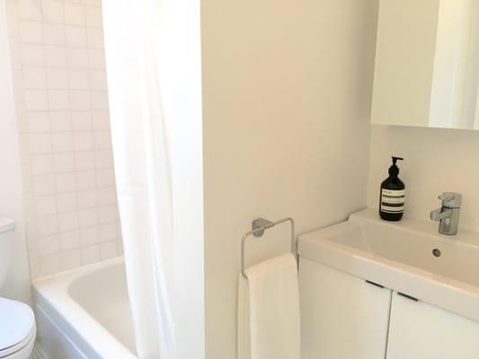 Hotel style bathroom with deep soaking tub