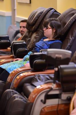 At GHHC, you wait sitting in a nice state-of-the-art massage chair!