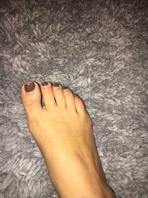 Over 1 month later and still looking great! Kim is awesome!! (Gel pedicure)