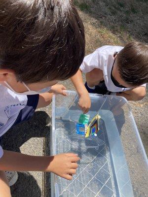 Little Engineers test their designs.