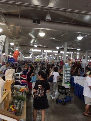 Rows and rows full of vendors and shoppers