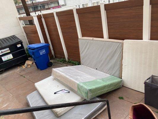 These mattresses that stayed here for about two weeks until they were moved to the street