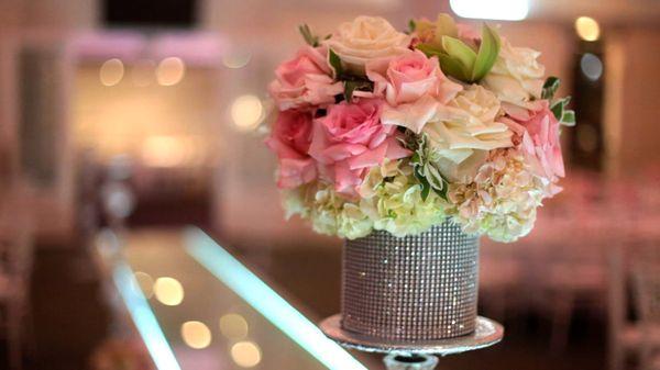 A Flower arrangement on the isle for the ceremony.