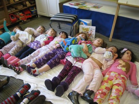 Playing "Ten in a Bed" on Pajama Day.