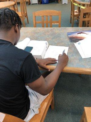 Student working hard on SAT prep