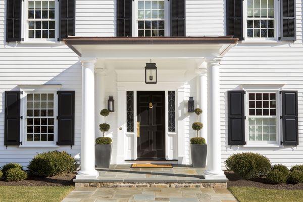 Adding a front porch with special molding and other details brings depth and character to a home.