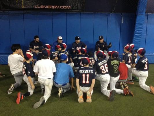 Coaches giving closing remarks at the Junior Winter Training Program.