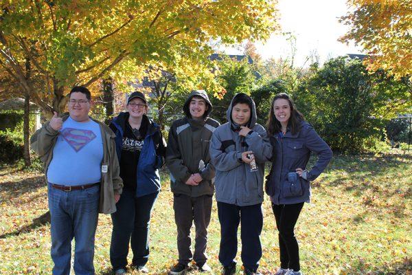 Students and staff at The Aurora School enjoying a fall walk on the campus grounds.