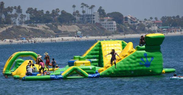 inflatable water playgrounds at local beaches