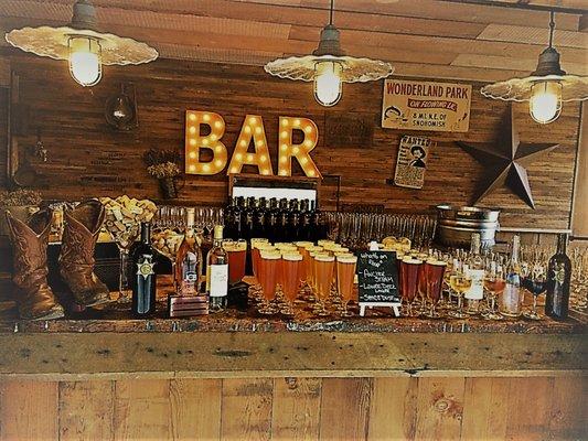 Green Gates Bar set up for an event by Alexa's Catering.