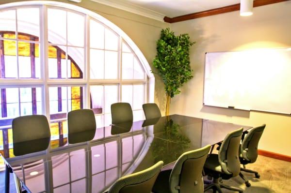 Conference Room- Vintage, Amber-Stained two-story Italian Renaissance Palazzo-Style Arches. Holds 8.
 
 Schedule a Tour Today | 404.618.0789