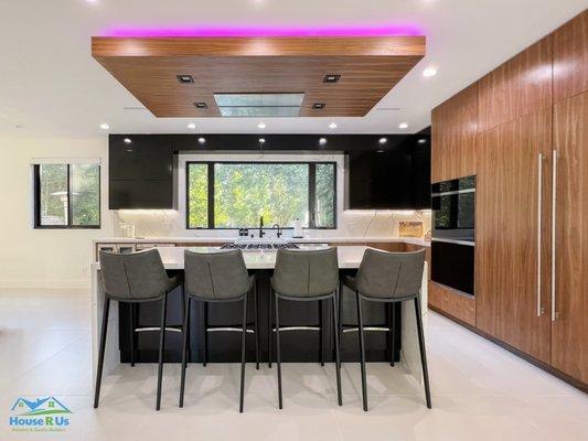 Kitchen remodel with 2 tone custom cabinets and waterfall countertops