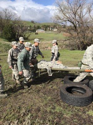 Working with the local JROTC on some medical drills.