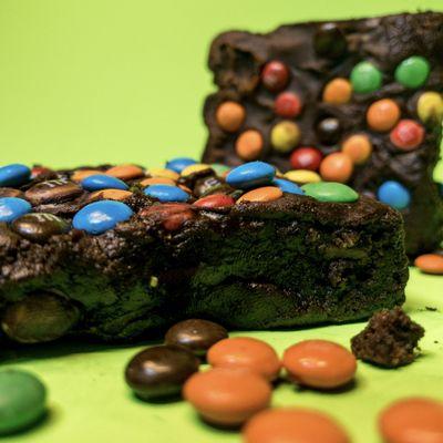 Galaxy Brownie! A spin on the classic brownie from your childhood but upgraded w/ real handmade fudge topping & your favorite M&M candies!