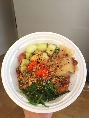 Poke bowl with marinated salmon, marinated tuna, and octopus