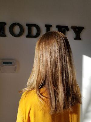 Work by Mitch at Modify Hair Lounge: A dimensional color and mid length haircut.