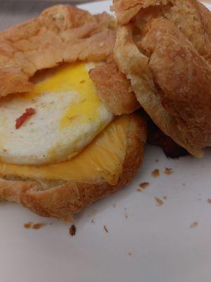 Bacon egg and cheese on a toasted Crossiant