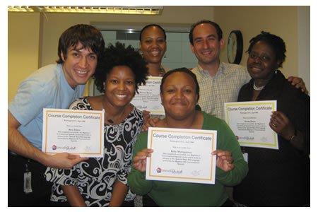 Satisfied Spanish students graduating from their Spanish course