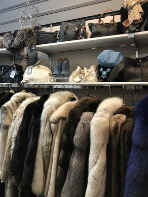 Seasonal Fur room open Oct 1 - March 31 with stoles, jackets, strollers, full length, hats, gloves, scarves and boots.