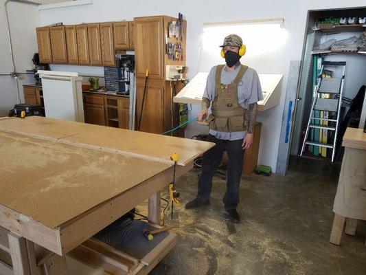 Daniel hard at work making custom cabinets