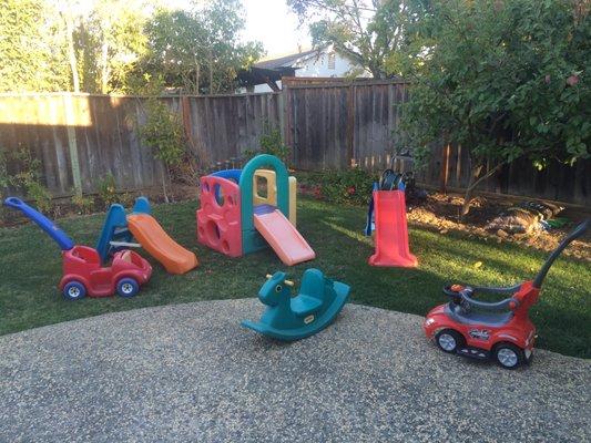 The play structure, slides, and ride-ons are perfectly kid-sized!