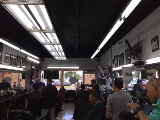 Inside the barber shop...hardworking men!