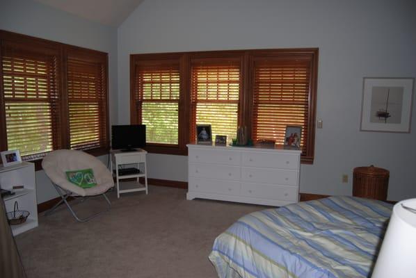 Guest Bedroom: Custom Wood Blinds finish these windows off with a nice clean look.