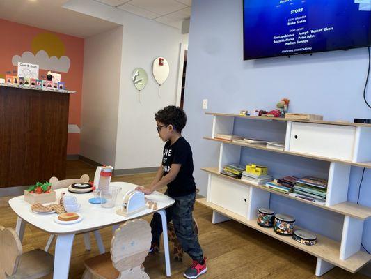 Play area in the waiting room for the kids