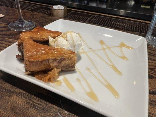 Baklava & ice cream garnished in caramel sauce