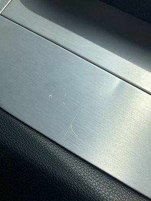 Scratched and bent airbag cover