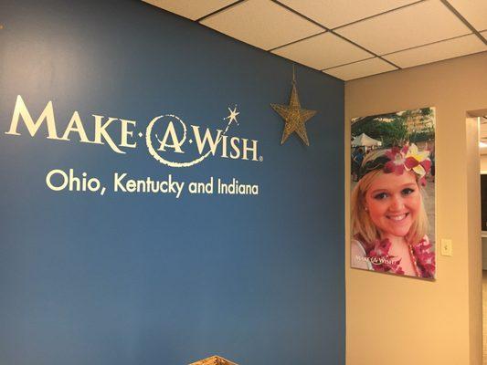 Front lobby and the office is full of wish kids photos.