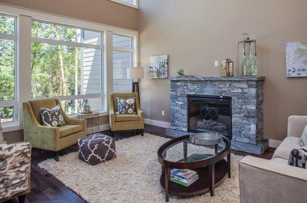 Natural stone veneer fireplace with stone hearth and mantel