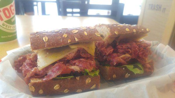 Hot Pastrami on wheat with tomato, mustard and spring mix. Very good 6in sandwich for the buck.