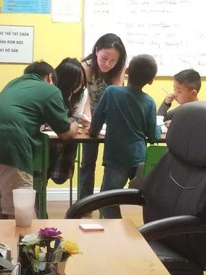 Working hard with her students.