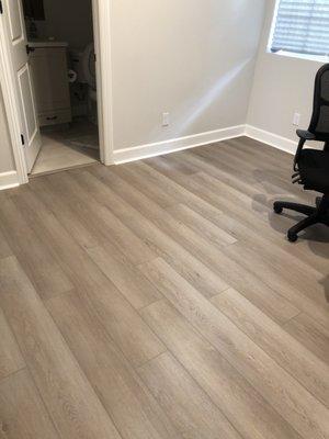 One of the many bedrooms where carpet was replaced. Note the superb baseboard work.